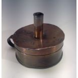 A late 19th century copper tinder box chamber stick. Height 10cm.