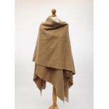 A Harvey Nichols 100% lambswool camel coloured shawl.