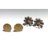 Two pairs of Jack Trowbridge earrings, one pair is in the form of flower heads in gold and silver,