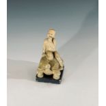 An Art Deco period painted plaster model of a child riding a large tortoise, James Bourlet paper