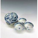 Three Chinese blue and white porcelain tea bowls and saucers, 18th century.
