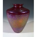 A 20th century Royal Brierley Studio glass vase, red ground with gold decoration, signed to base.