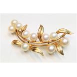 A 14ct gold Mikimoto pearl mounted brooch, makers and purity marksCondition report: Length 4.9cm,