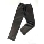 A pair of butter soft, jeans style, black leather trousers by Banana Republic, fully lined, label