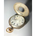 A gold and silver keyless pocket watch by Benson, 'The Field', in engine turned half hunter case