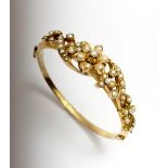 A 9ct gold Victorian hinged bracelet set with pearls 16.8gmCondition report: Although outwardly in