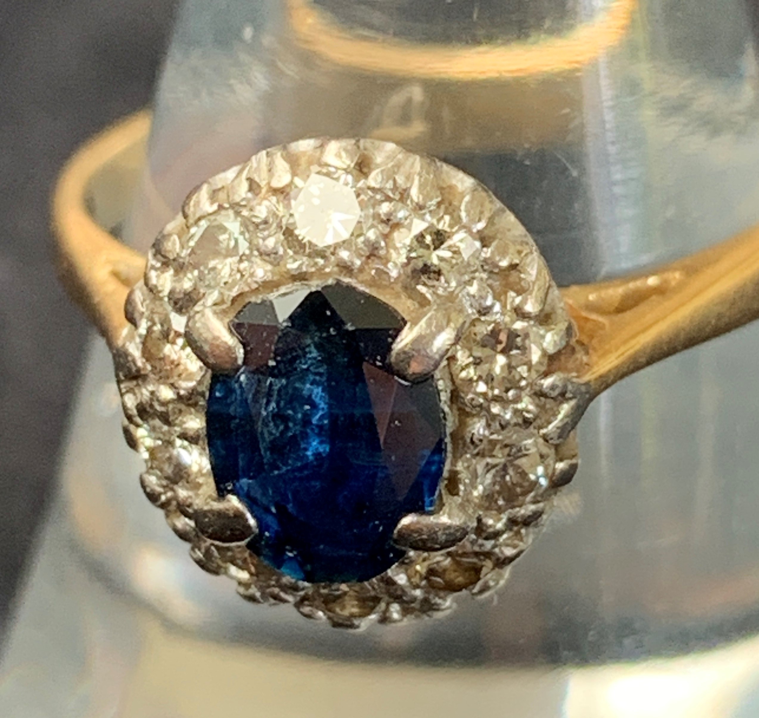 A gold sapphire and diamond oval cluster ring.Condition report: This 18ct gold ring is size K the - Image 2 of 2