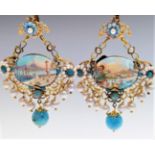 A pair of remarkable ornate Neapolitan earrings each painted with a fine miniature view of the Bay