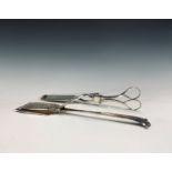 A pair of electroplated asparagus tongs with engraved and pierced decoration, armorial crests to