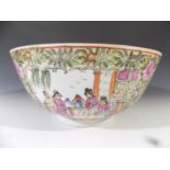 A Chinese Canton porcelain bowl, 20th century, decorated with figures, birds and floral sprays.