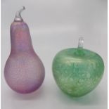 Two John Ditchfield for Glasform iridescent glass paperweights in the form of an apple and a pear,