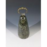 A Cornish serpentine door stop with elaborate brass handle. Height 30cm.Condition report: No