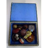 A small box and contents of assorted curios.