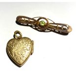 A 9ct gold brooch and locket