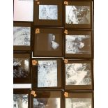 An interesting collection of 51 numbered magic lantern slides in original wooden box relating to the