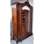 A French walnut armoire, 20th century, with a large mirrored single door, height 242cm, width