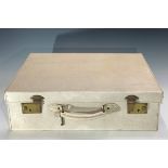 A Watajoy white leather ladies travelling boudoir case, burgundy taffeta lining, with brushes,