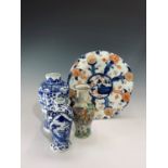 Two Chinese blue and white vases, circa 1900, each with four character Kangi mark, heights 18 and