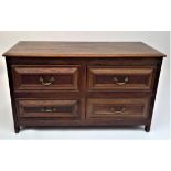 A George III style oak chest, with four drawers on stile feet, height 72cm, width 125cm.