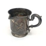 A Victorian jug engraved with a classical architectural scene. Height 7cm.