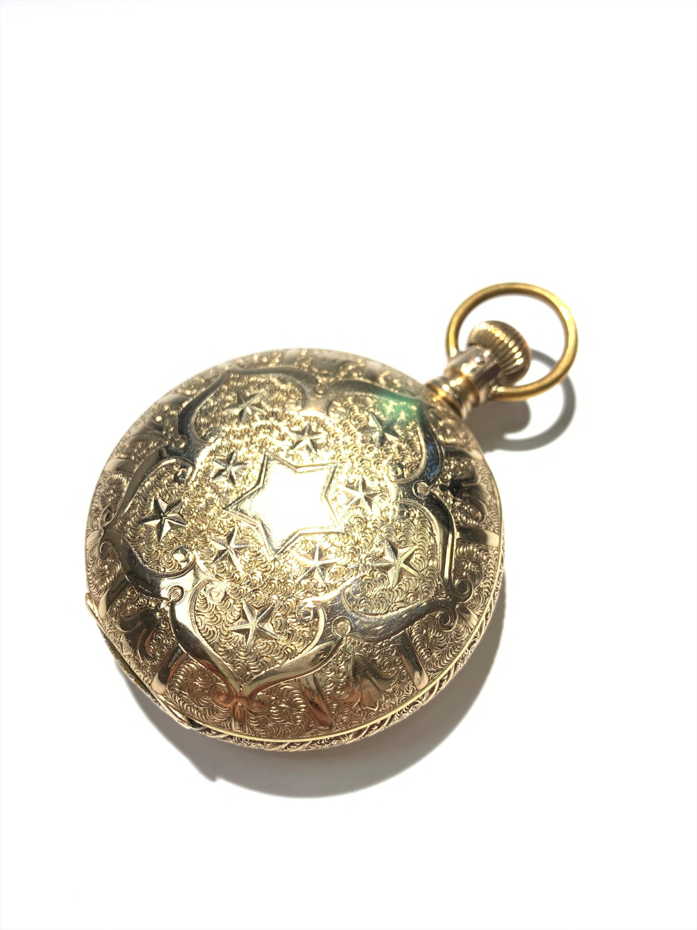 An American Waltham keyless full hunter Mascot cased pocket watch with chased decoration, the