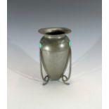 An Arts & Crafts period pewter vase, with matrix turquoise cabochons, impressed marks to base,
