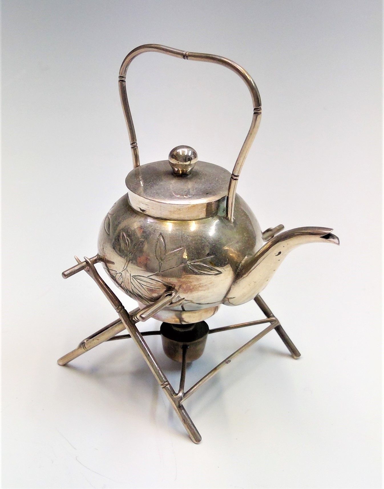 A Chinese silver miniature tea kettle and stand 25gm height 75mm