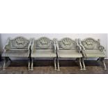 A set of four 19th century green painted cast iron garden seats, possilby Coalbrookdale, the oval