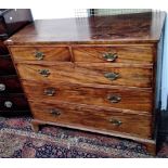 A Georgian mahogany chest of drawers, with two short and three long drawers on bracket feet.