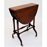 A Victorian mahogany oval Sutherland table, with swivel top, turned legs and stretchers, height