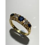 An 18ct gold Victorian style ring set with two diamonds and three sapphires, together with an