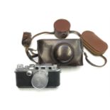 A Leica 11c camera, serial no. 446993, together with various accessories.Condition report: There are