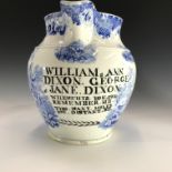 A large blue printed pearlware jug, circa 1840, inscribed 'William & Ann Dixon. George & Jane Dixon.