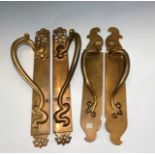 A pair of Art Nouveau period bronze door handles, height 41.5cm, together with one other similar