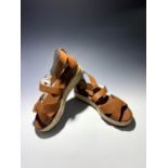 A pair of unworn toffee brown leather gladiator style espadrille sandals with gold buckles by