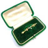 A 15ct gold bar brooch, boxed