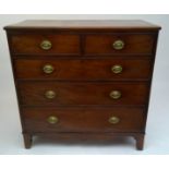 A George III mahogany chest of drawers, with two short and three long drawers, on bracket feet,