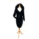 A 1980s black velvet long sleeved knee length dress by Sophie Sitbon of Paris, with large ruched