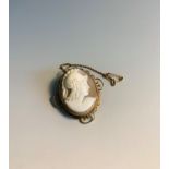 A gold mounted cameo brooch
