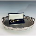 A pair of silver plated grape scissors, cased, and a gallery tray, length 41.5cm.