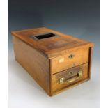 A 1920s mahogany shop till, fitted with a single cash drawer, with mechanism ringing bell. Overall