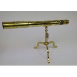 A WWII brass telescope sighting scope,' No38 MkI ARIC 1942 No 309', on folding tripod base, length