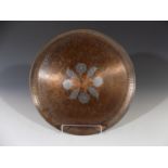 A Victoria House (Port Isaac, Cornwall) copper tray, with central inlaid flower head and leaf motif,
