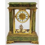 A green onyx torsion anniversary mantle clock, circa 1910, 400 day, with gilt metal mounts and