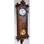 A 19th century walnut Vienna regulator type wall clock, the case with ebonised decoration, with