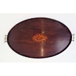 A George III mahogany and crossbanded oval tray, with central oval shell inlaid panel and brass