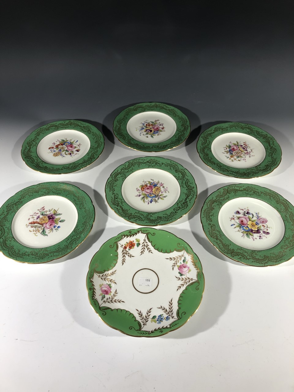 Six early 20th century Coalport plates retailed by T. Hayward & Co. of Manchester, each painted with - Image 6 of 9