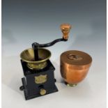 A J. & J. Siddons cast metal coffee grinder, height 21.5cm, together with a copper mould marked '