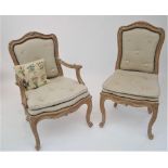 Two French style open armchairs.