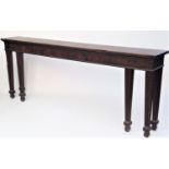 A mahogany serving table, 19th century, possibly Irish, the rectangular top above a plain frieze, on